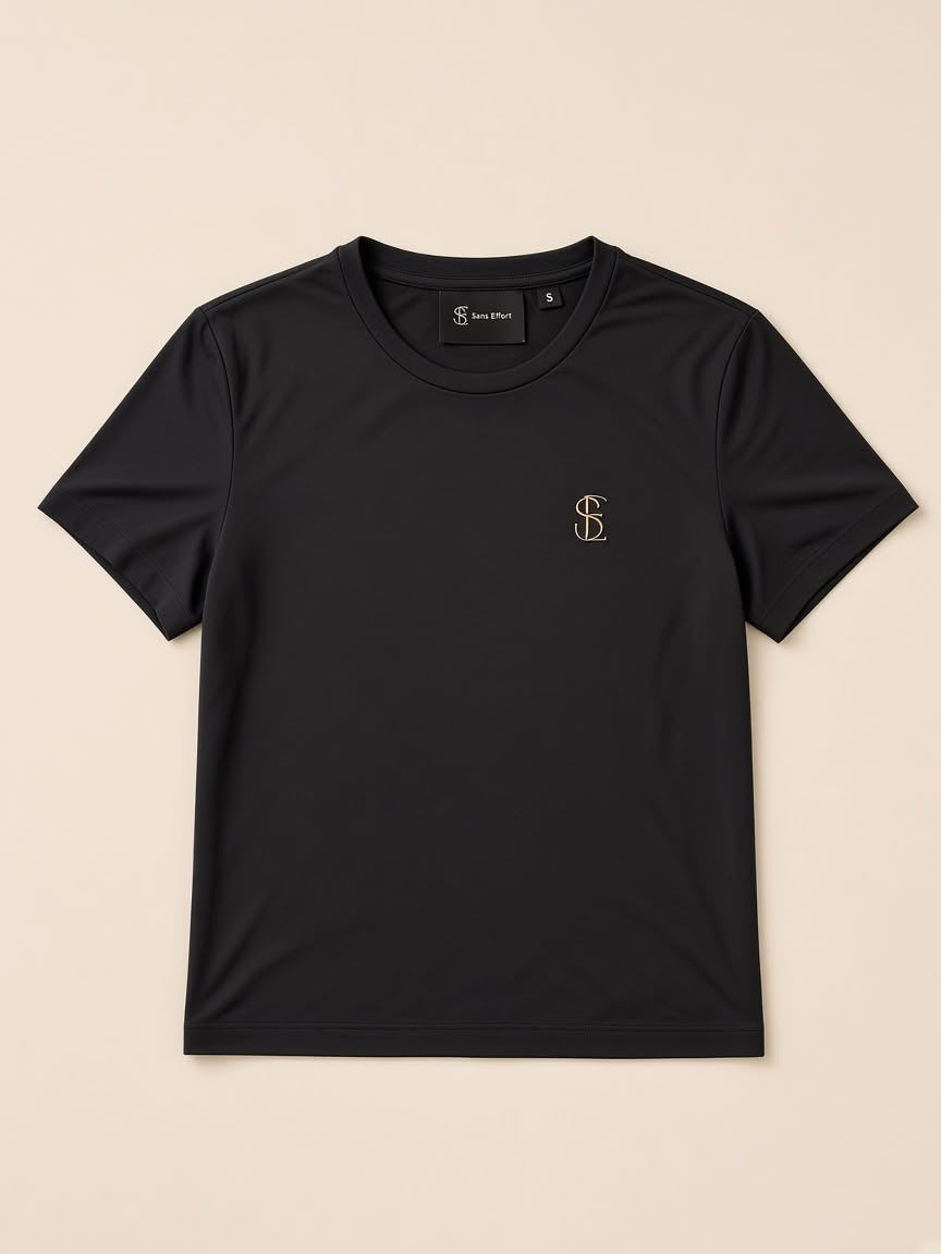 Élan Noir top, front, with gold SE monogram